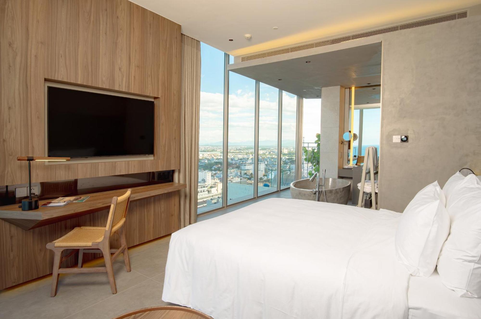 M Hotel Danang Esterno foto A bedroom at the hotel
